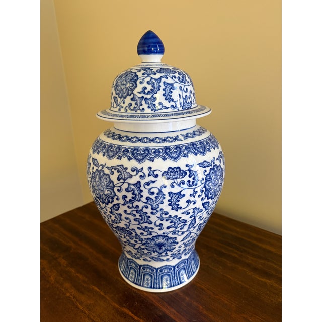 A beautiful large Chinoiserie blue and white porcelain covered ginger jar or temple jar China, Early 21st Century...
