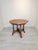 A unique, highly decorative octagonal table in an eclectic style, captivating with its craftsmanship, rich detail, and...