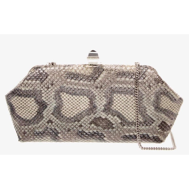 Judith Leiber Whitman Bag in Metallic Snakeskin City sophistication in one little bag, unobtrusive in size and high on...