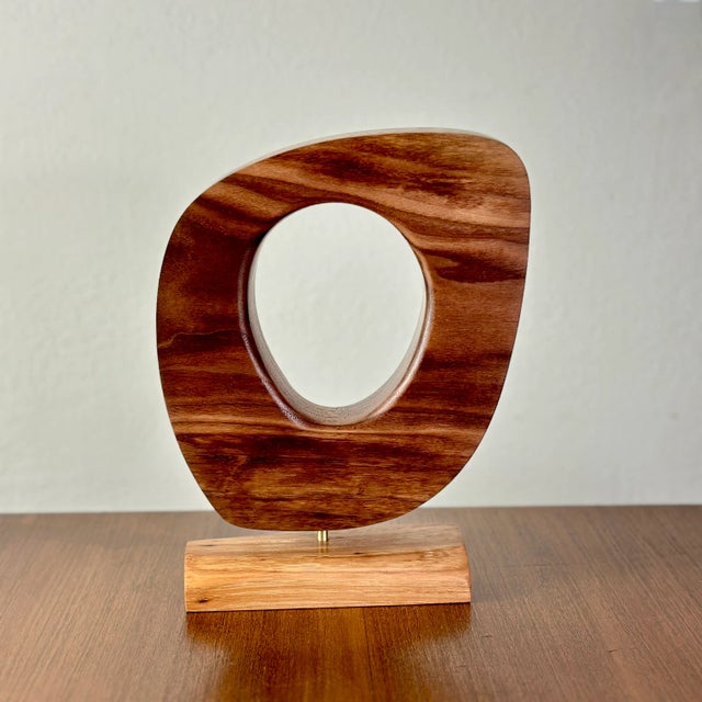 Contemporary Geometric Mid Century Modern style sculpture sculpted from Walnut and Red Oak hardwood and finished with...