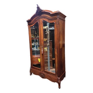 Antique French Louis XV Walnut Armoire Dual Beveled Mirrored Doors For Sale