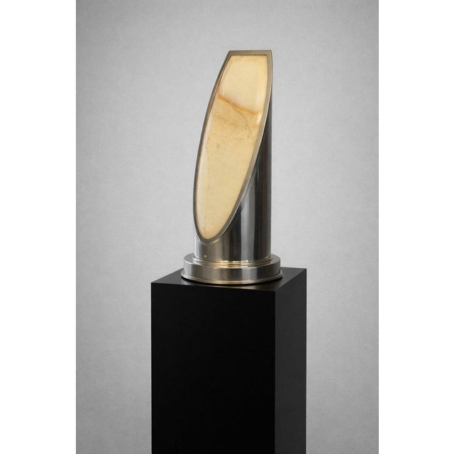 This striking Art Deco style table lamp dates from the 1970s and is a truly rare find. It is a handcrafted piece, and only...