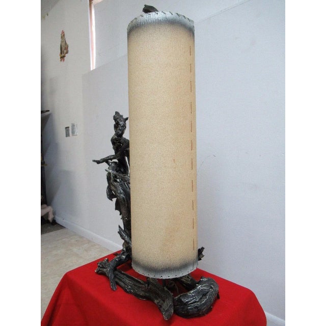 A Mid-Century driftwood cylinder table lamp. Measurements ( l x w x h) 23 x 15 x 42". Great shape... Minor wear and some...