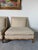 An elegant pair of 1970s Hollywood Regency armless lounge chairs in the style of John Widdicomb. These generously...