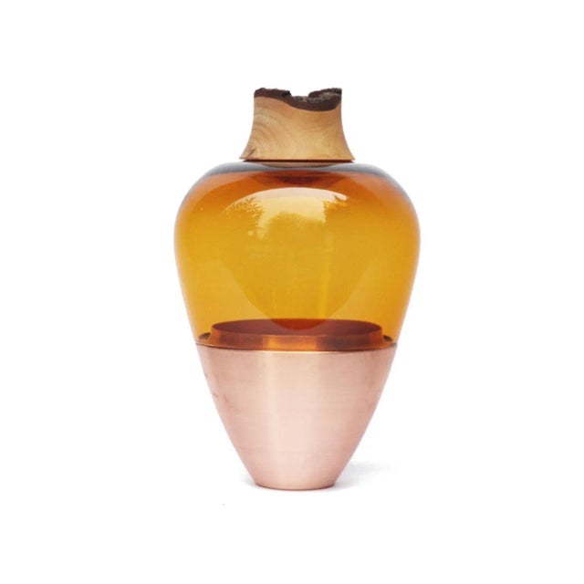 Amber and copper sculpted blown glass, Pia Wüstenberg Dimensions: height 20 x diameter 38cm Materials: hand blown glass,...