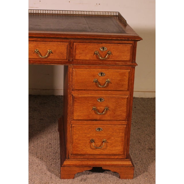 Elegant 19th-century English light oak pedestal desk This beautiful pedestal desk has been crafted on both sides, allowing...