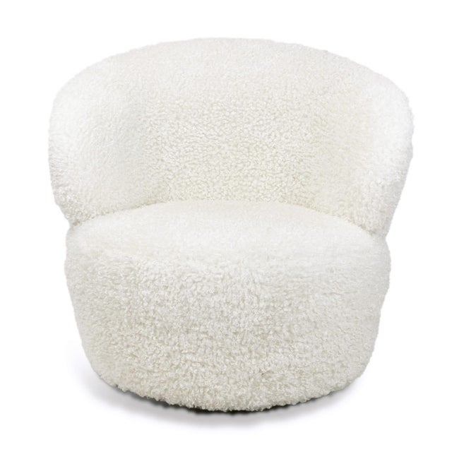 The Myra Chair's soft boule faux wool seat and modern, curved form is both cozy and glamorous. She's even complete with a...