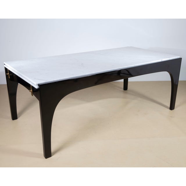 A monumental, highly architectural large "Partenio" extendable dining table, designed by the legendary Italian architect...