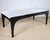 A monumental, highly architectural large "Partenio" extendable dining table, designed by the legendary Italian architect...