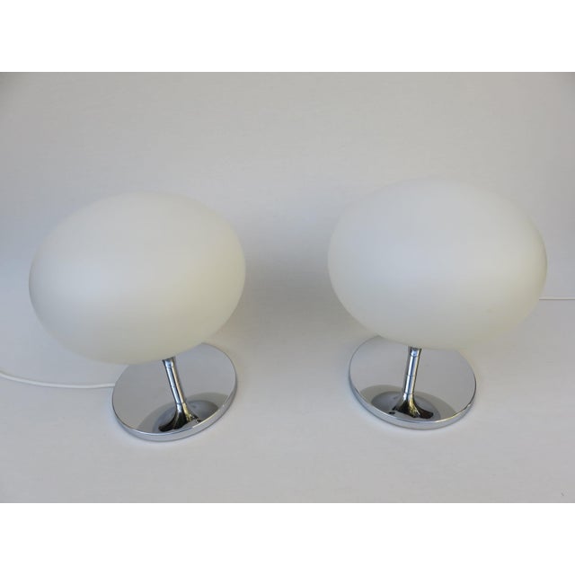 A pair of rare Space Age table lamps, manufactured in the 1970s by Kaiser-Leuchten. In keeping with the style of the era,...
