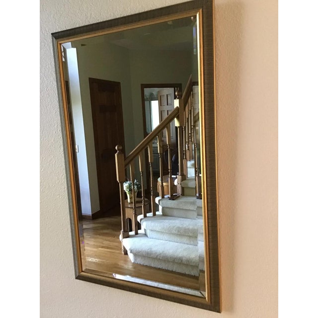 Vintage Beveled Wall Mirror. The beauty of this mirror sparkles with the bevel surrounding the mirror and the pristine...