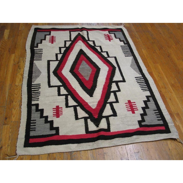 Antique American Navajo Ivory 1930s Rug, Circa Date: 1930s. This exceptional weaving represents the pinnacle of American...