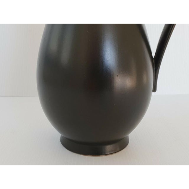 Very good condition. Height 31.5 cm. Length 18 cm. Width 15 cm. Very beautiful pitcher. This piece has an attribution...