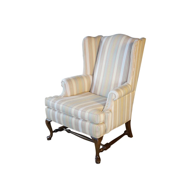 Add timeless sophistication to your home with this vintage wingback accent chair from the highly coveted Ethan Allen...