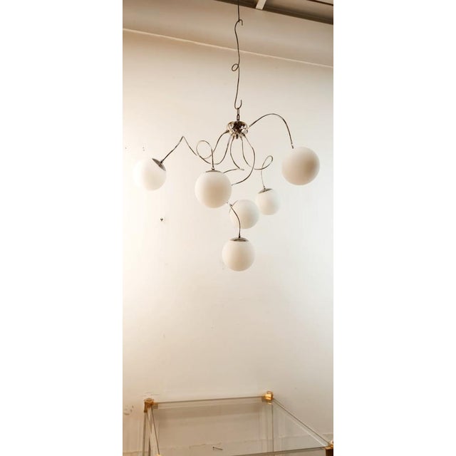 Adjustable Hanging Lamp with White Sphere Glass, in Flawless conditions. Designed 1980 to 1989 Up to 250V (Europe/UK...