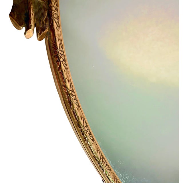 An exceptional antique French oval vanity tray, beautifully framed in warm gilded metal with magnificent three-dimensional...