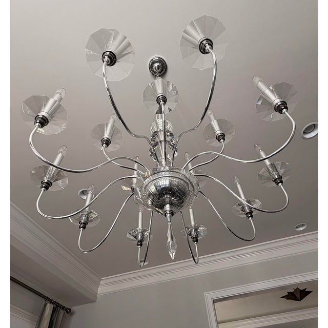 The Schonbek Jasmine Chandelier is a paragon of contemporary elegance, offering a stunning blend of minimalism and...