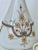 French White opaline bottle finely hand-painted with gold flowers and exquisite details all around the body. The cap is...
