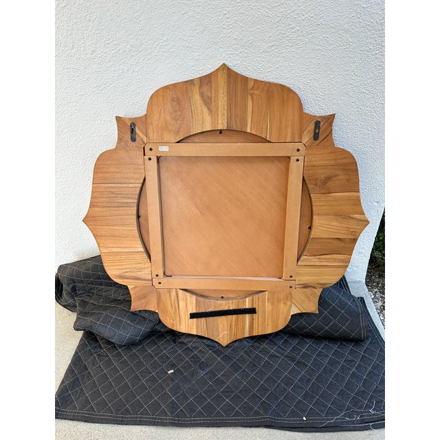 Beautiful solid wood Lotus Mirror. It hung in my child's nursery. A beautiful addition to any space!