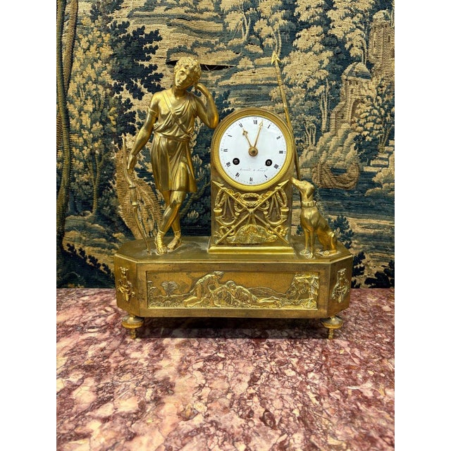 Melancholy Love Clock, Empire Period. French work from the Empire period, circa 1800. Depicts the god of Love...