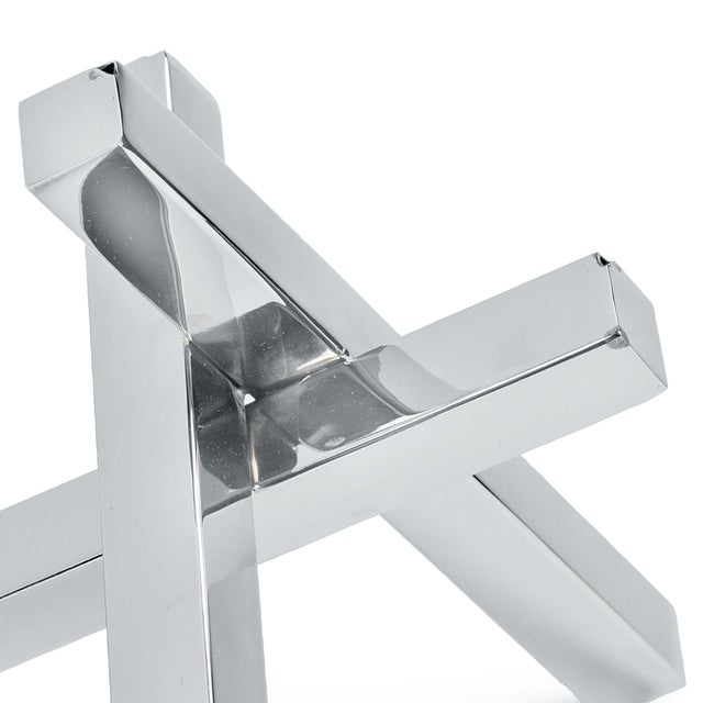 An elegant form of balance and depth, the Intersecting sculpture’s polished nickel finish would be right at home in a...