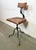 Industrial height adjustable swivel chair made in former Czechoslovakia during the 1950s.The construction is made of gray...