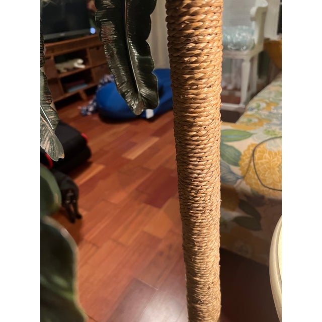 Circa 1980s woven wicker floor lamp with tole leaves Palm tree floor lamp with a brass pineapple finials. Lamp base widest...