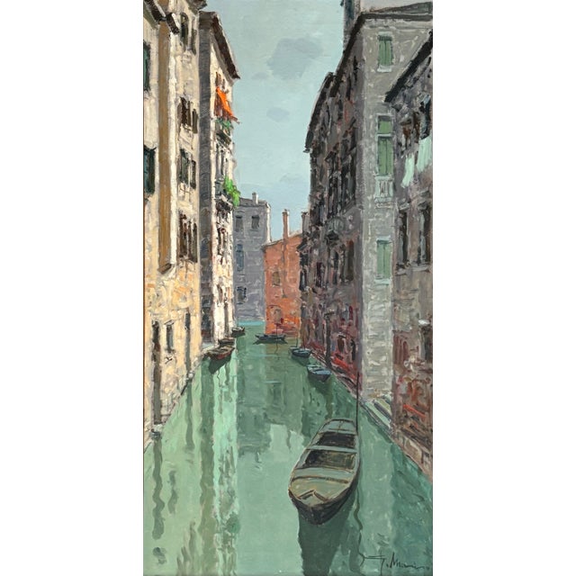 A beautiful and bright oil painting of the canal in Venice by Italian Impressionist, Guiseppe Marino (1916-1975). A circa...