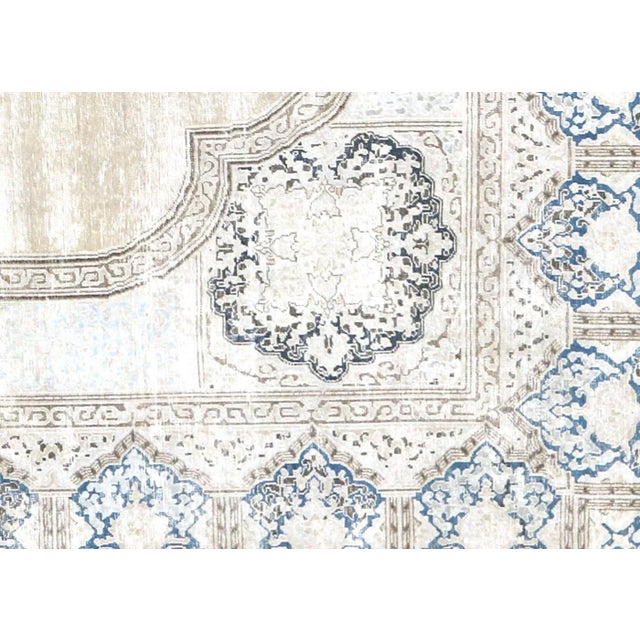 1940s Persian Kerman Carpet. Hand woven in the Kerman region of Iran. Distressed and refinished in the U.S. The Persian...