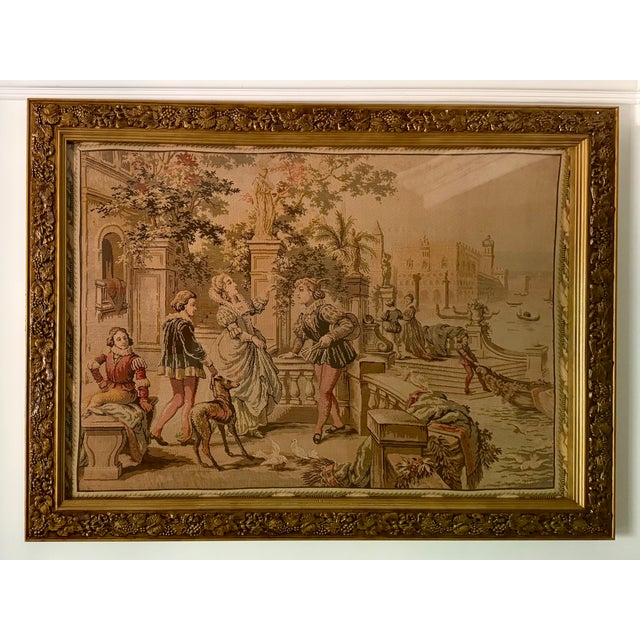 Likely mid-20th century, Aubusson-style and French in origin. Presented in a late ornate giltwood frame carved with...
