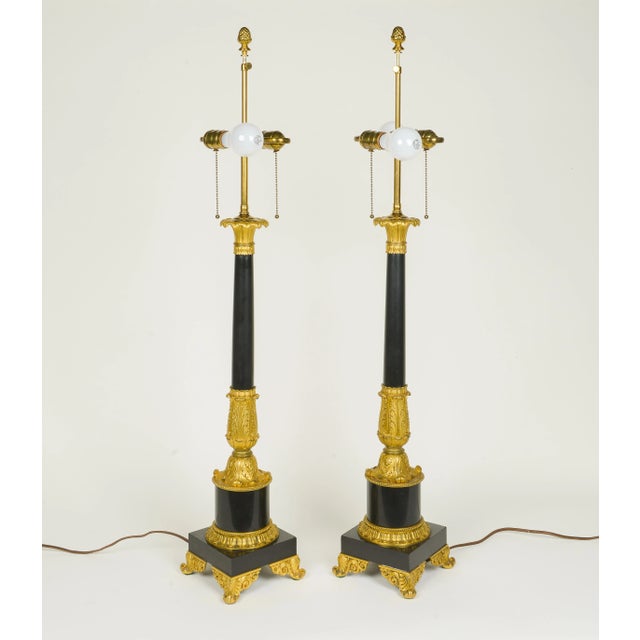 Traditional Pair of Empire Style Black Stone and Ormolu Lamps For Sale - Image 3 of 12