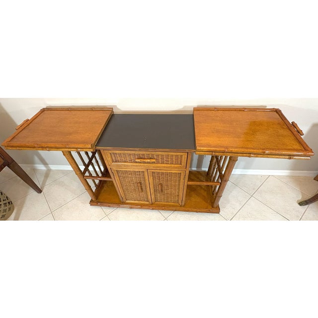 Great vintage coastal Palm Beach Chic bar cart by American of Martinsville from the mid 20th century. The piece is made of...