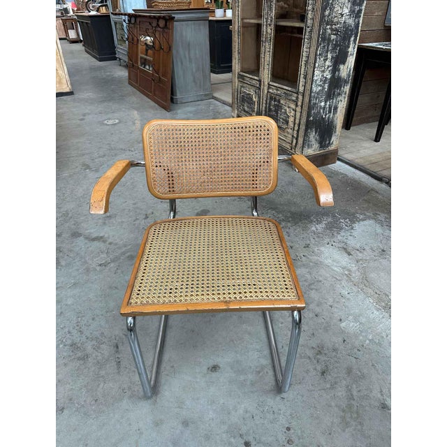 Marcel Breuer’s iconic B64 armchair. A reissue from the 1980s, made in Italy. Chrome-plated tubular steel frame, with a...