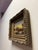 A charming and highly decorative mid-century European oil painting on board depicting a classic pastoral river landscape....