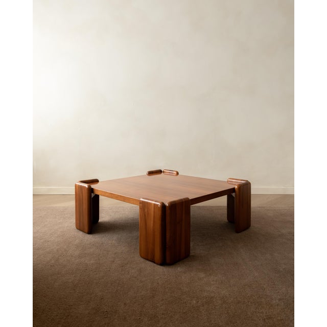 A vintage italian sapporo coffee table in walnut, designed by mario marenco for mobil girgi and produced in italy during...