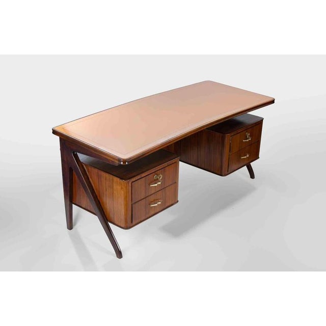 Vittorio and Plinio Dassi, midcentury Sideboard. Width 200 cm - Height 97 cm - Depth 50 cm - Rosewood, metal and glass....