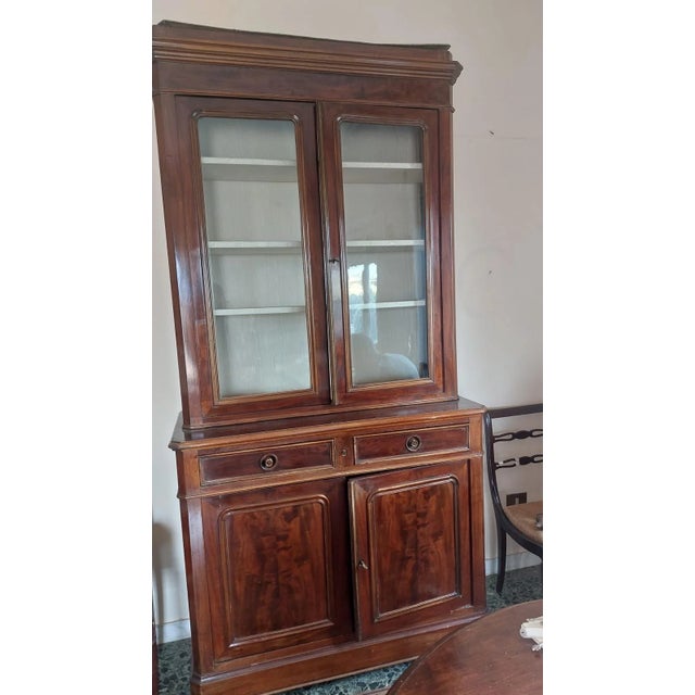 Cherry Display Cabinet, Two-Part, Mid-1800's A handsome two-part cabinet with glazed upper doors and storage below. Upper...