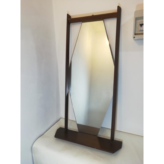 Original 1950s modernist mirror with geometric shapes. Beautiful lines, including a shaped shelf. Hexagonal mirror...