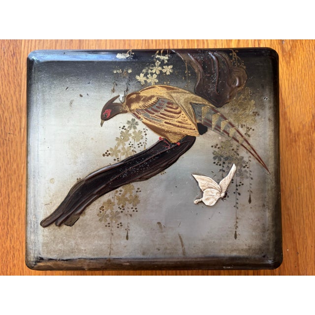 An exquisite antique Japanese urushi lacquer box dating from the late Meiji to early Taisho period (circa 1900–1920). The...