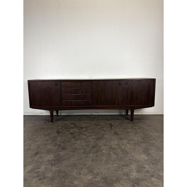 Scandinavian Sideboard in Wood with 2 Doors and 4 Drawers, 1960s, in Very Good conditions. Designed 1960 to 1969