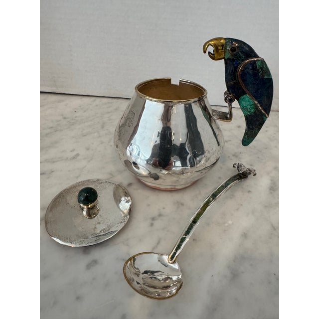A playful silver plated service set by Los Castillo, crafted in Taxco Mexico in the 1960's. This collectible set includes...
