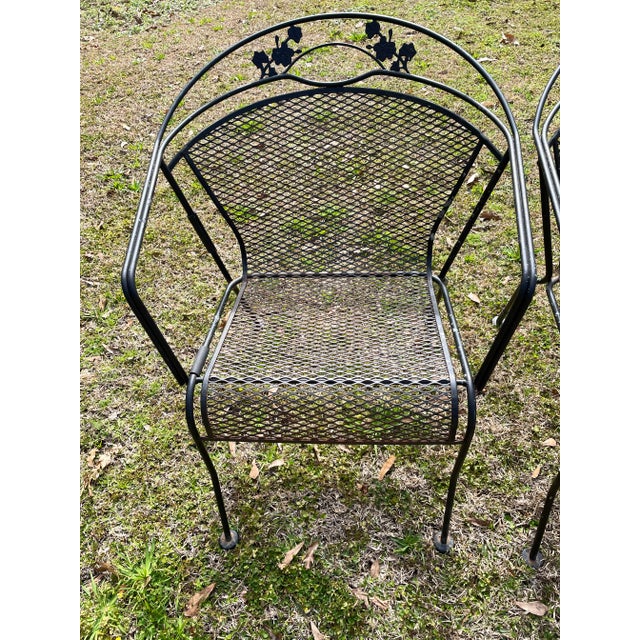 This pair of wrought iron and mesh patio chairs are perfect to add to your collection or to fill a space in your garden...