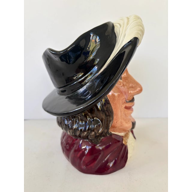 This vintage Royal Doulton character mug depicts Porthos, one of the legendary Three Musketeers. Model D6440, designed by...