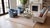 Exuding quiet luxury and exceptional artistry, this fine antique wool rug features a dense, intricate geometric...