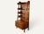 An elegant vintage bookcase from the 1960s, characterized by an asymmetrical silhouette inspired by Scandinavian and...