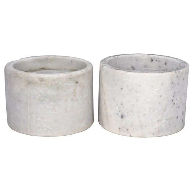 These simple yet sophisticated candleholders have been hand-carved from solid marble. Sized for use with traditional...