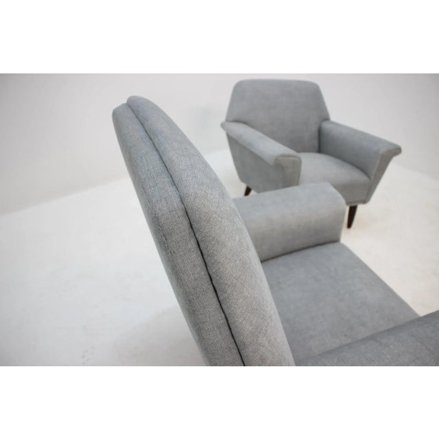 These lounge chairs have been newly upholstered in light blue color upholstery.