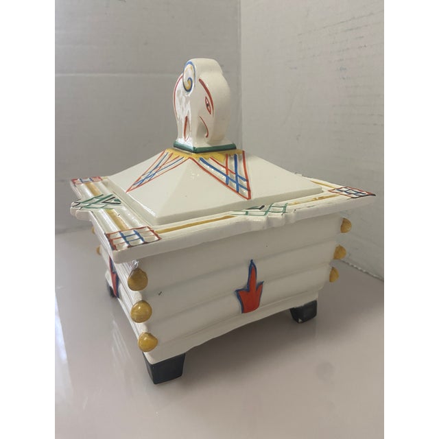 Early 20Th Century Art Deco Sculpture Porcelain Jewelry Box Very detailed lines With colors of Blue, Yellow, Orange and...