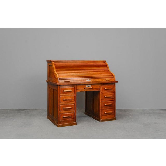Item: Roll-top desk Period & Style: Industrial design - Early 20th century Features - Stylish and practical piece of...