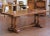 Bring rustic warmth and timeless craftsmanship to your dining space with this antique solid oak farm table from France,...